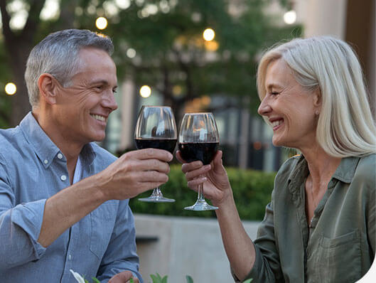 GenuinePurity Longevity+ - Mature couple enjoying wine